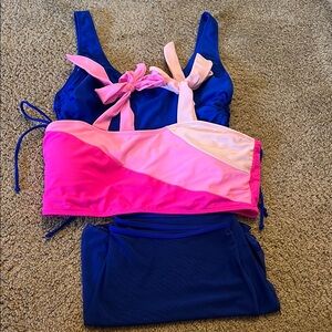2 Bathing Suit tops and 1 Bathing Suit Skirt